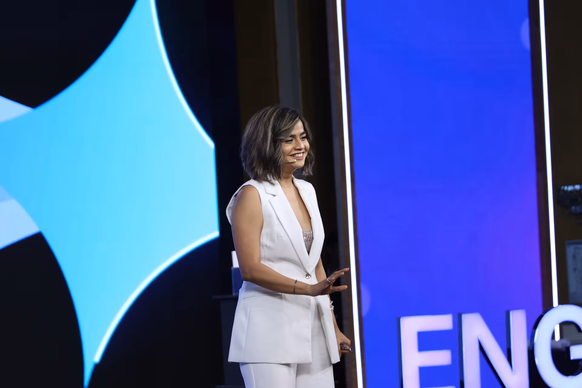 Speaker walking onto the EngageX stage