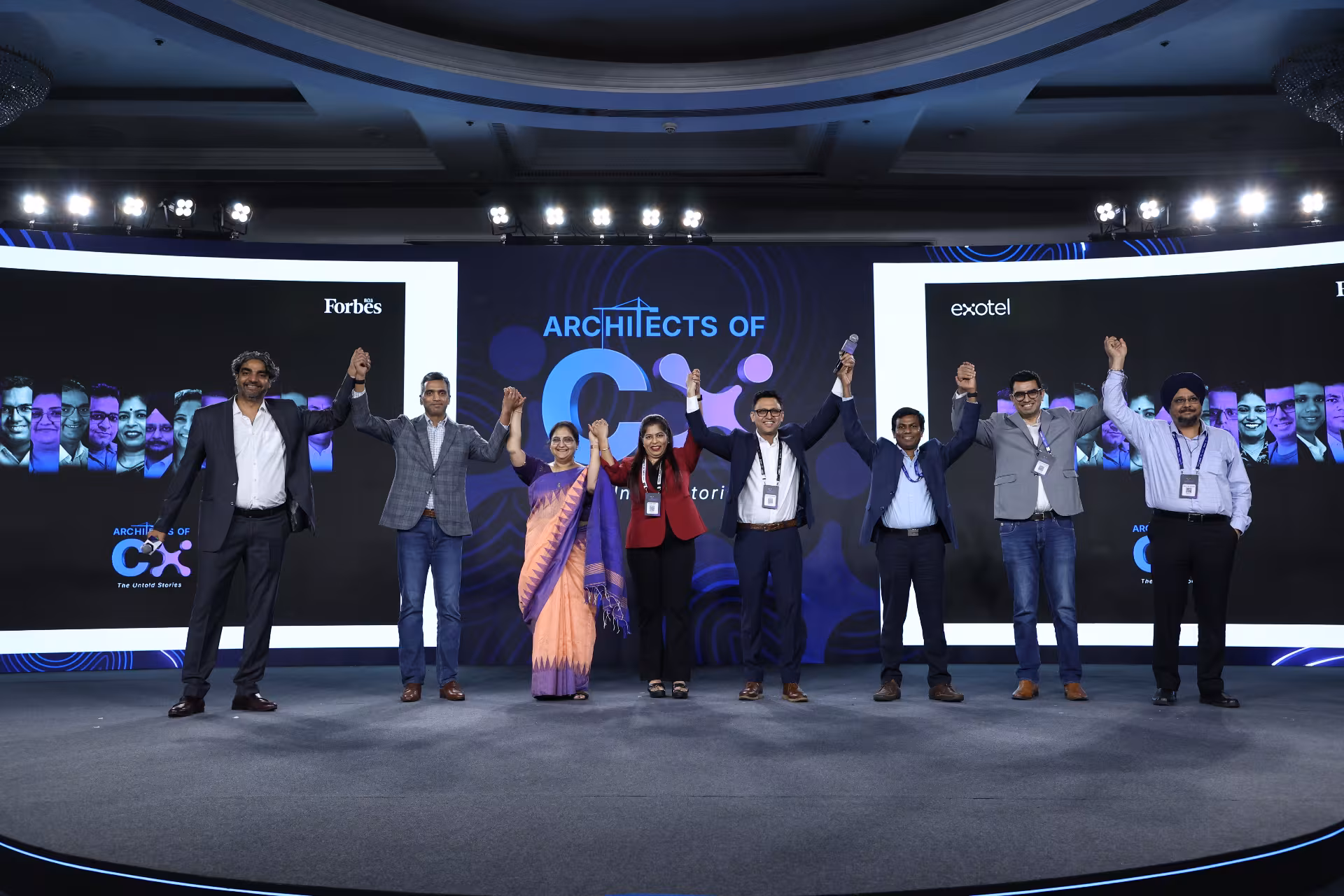 Architects of CX group photo on stage